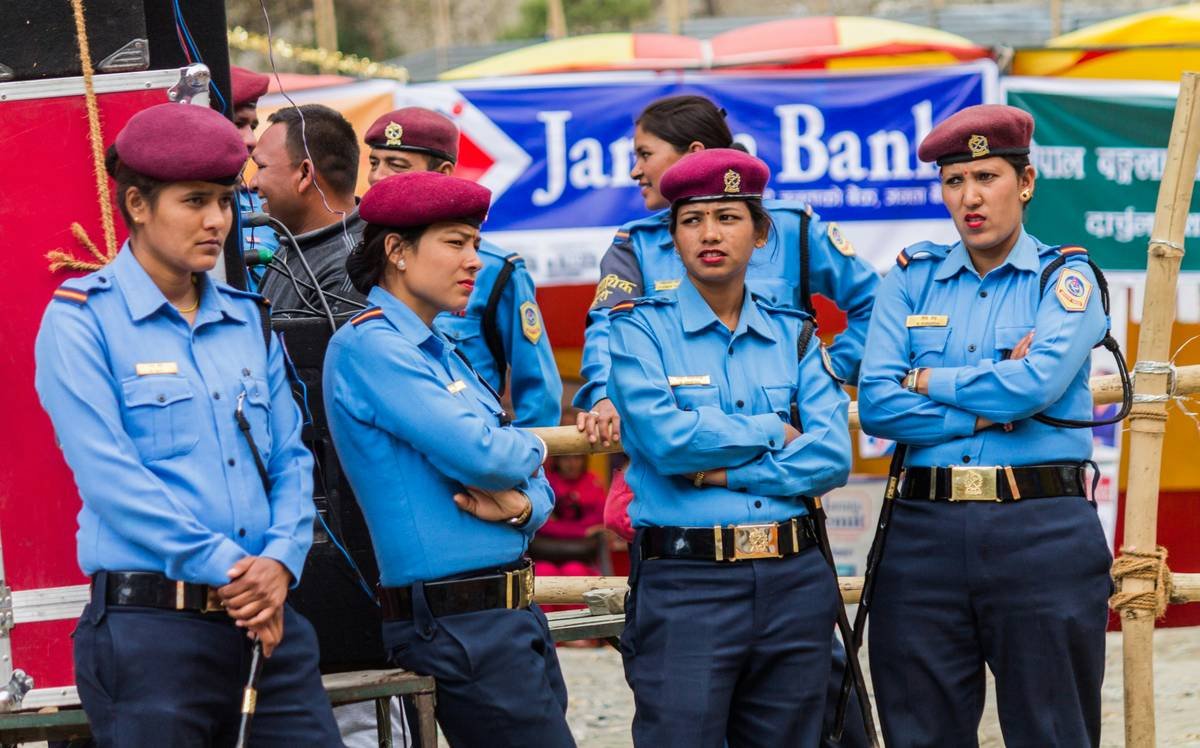 Police Woman on Duty at Darchula Mela, Far Western Nepal