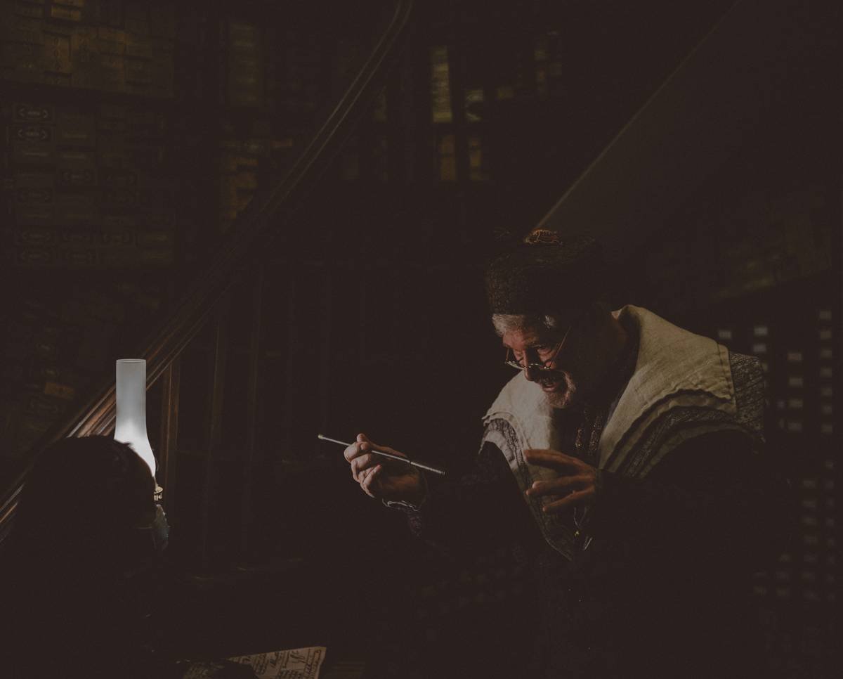a man holding a cigarette